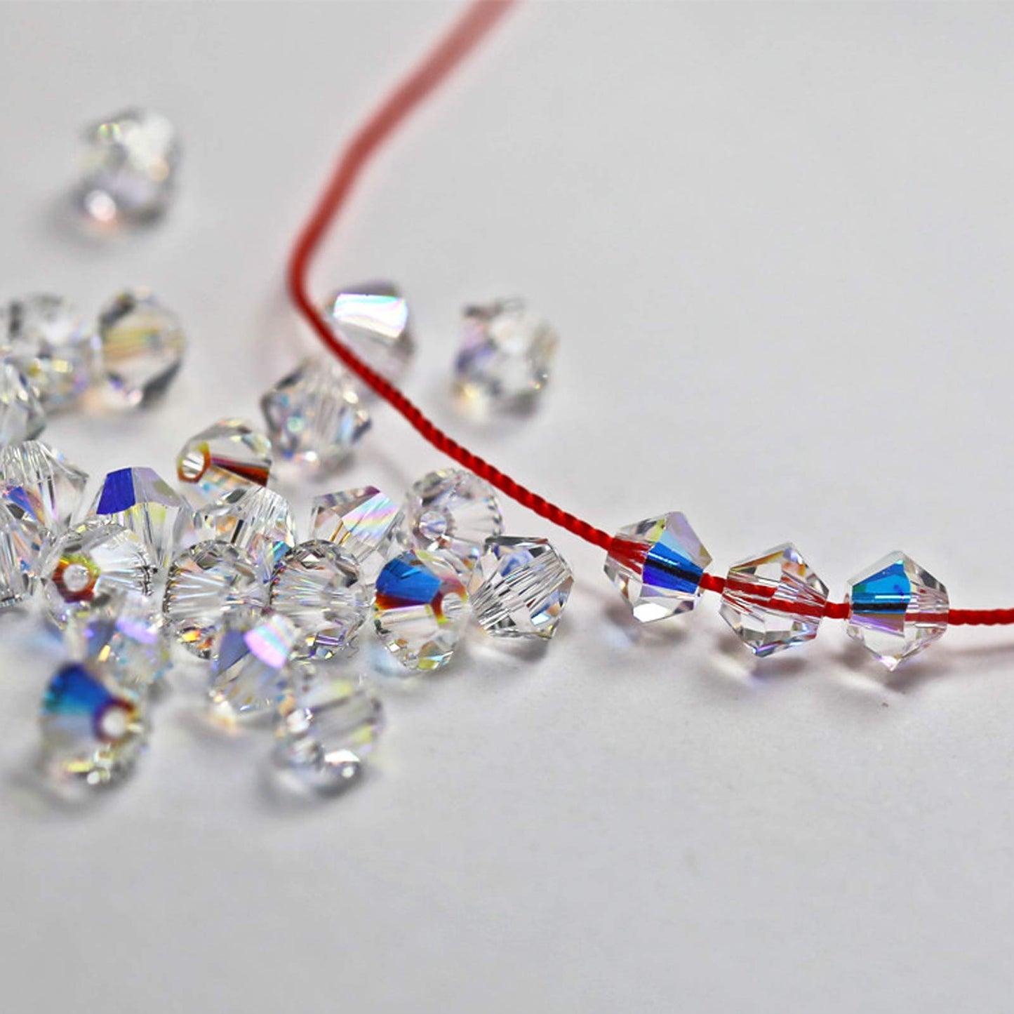 Dowarm 1000PCS Bicone Crystal Beads 4mm, Bulk Small Faceted Bicone Glass Beads for Jewelry Craft Making, DIY Bracelet, Necklace, Dolls (Crystal AB, 4MM)