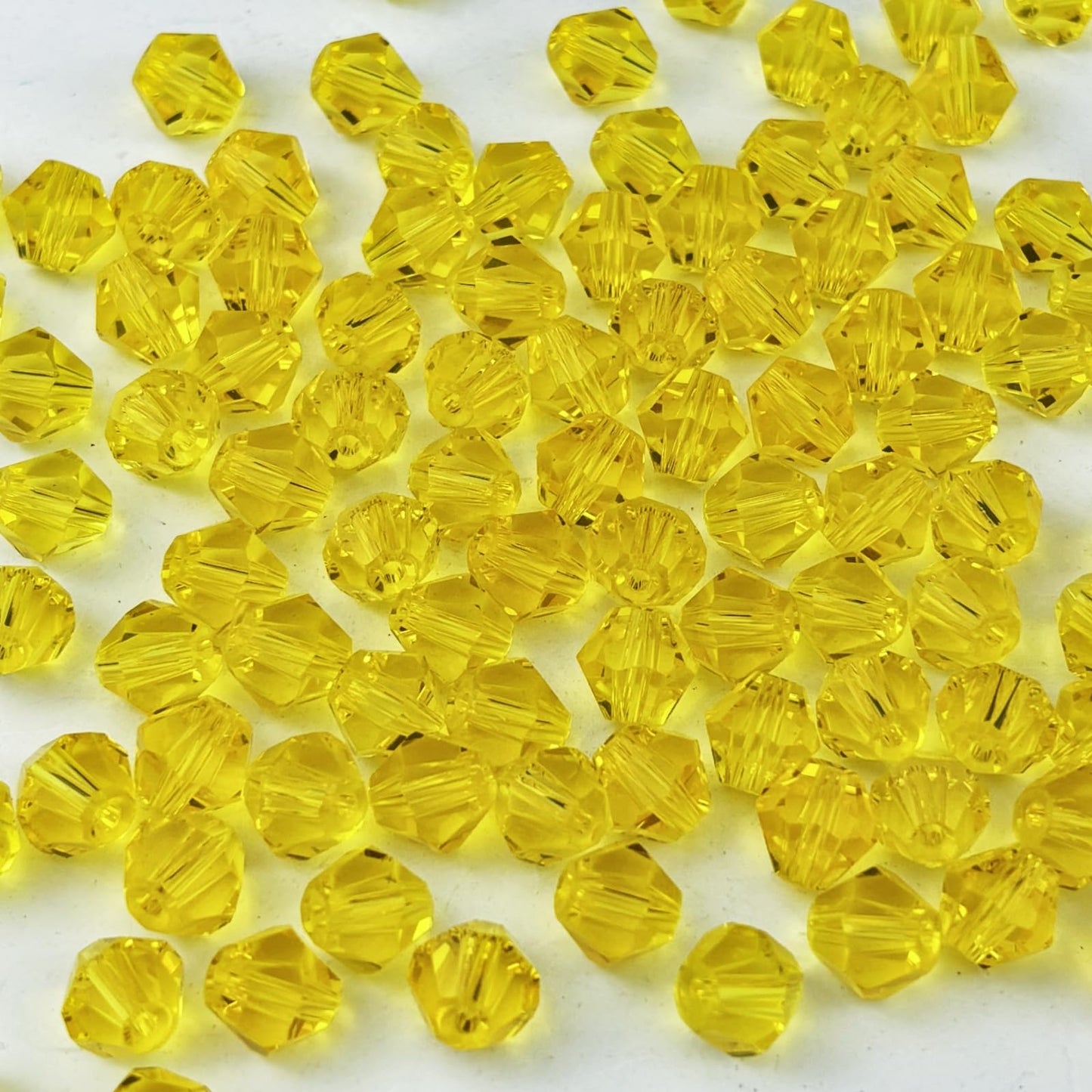 YUEXIGO 500pcs 3mm Bicone Glass Crystal Beads for Jewelry Making, Faceted Bicone Glass Spacer Beads for Bracelet Earring Necklace DIY Craft(Gold Yellow)