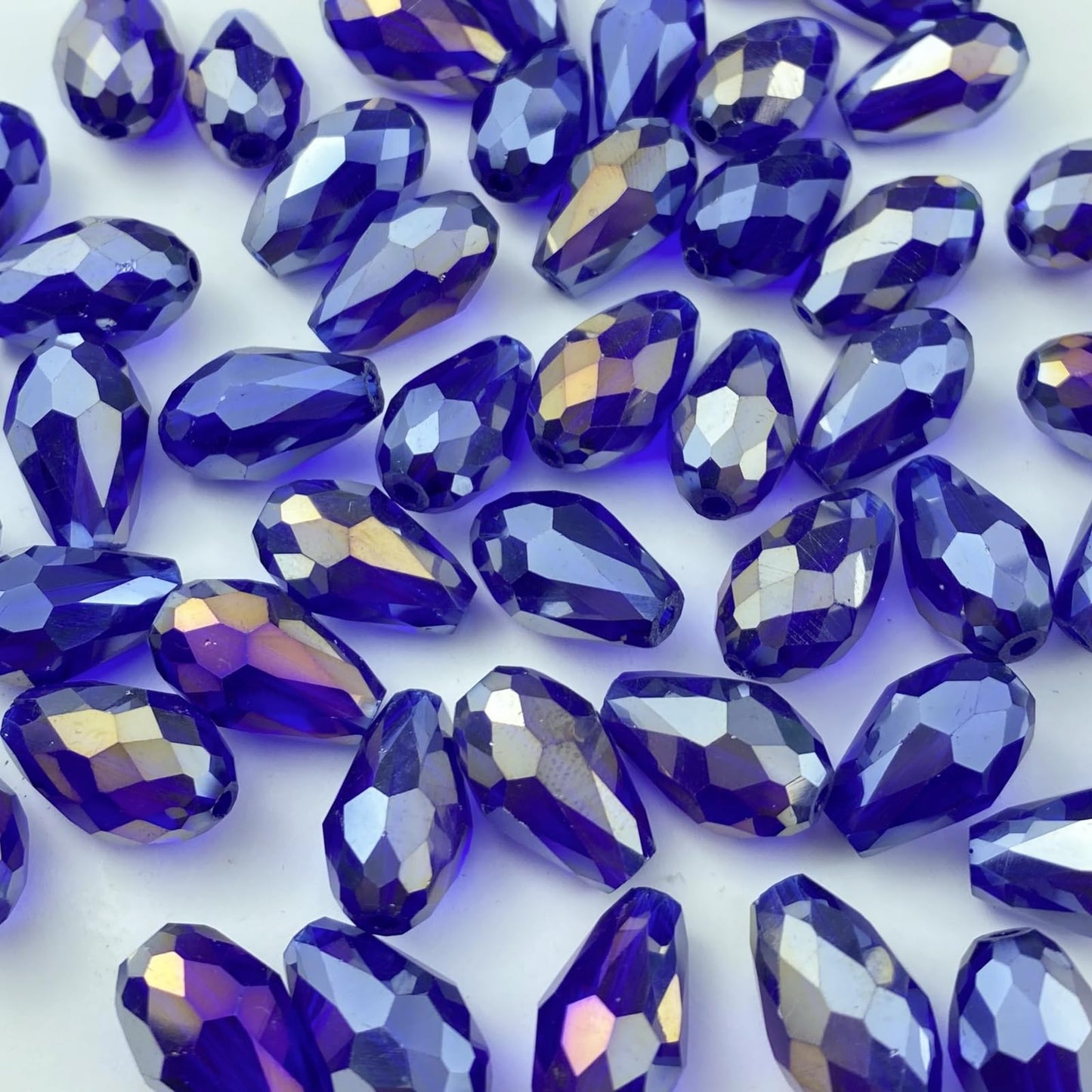 Honkoolly 100pcs 8x12mm Teardrop Crystal Glass Beads Vertical Hole Faceted Glass Teardrop Spacer Beads for Bracelets Necklace Earring DIY Jewelry Making Craft(Sapphire Blue AB)