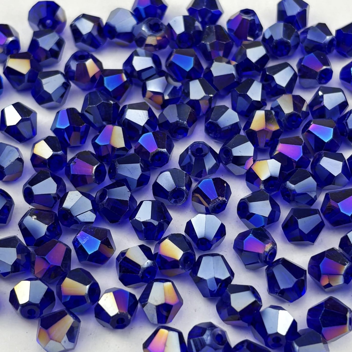 Pinhoollgo 100pcs 8mm Bicone Crystal Glass Beads Faceted Bicone Crystal Beads Bulk Glass Spacer Beads for Bracelets Necklace Pendants Earrings DIY Jewelry Craft Making(Dark Blue AB)