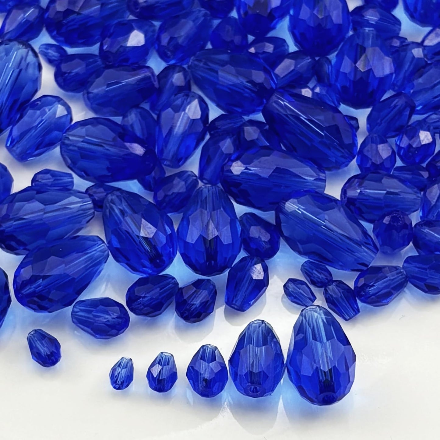 Xinhongo 340pcs Teardrop Crystal Glass Beads 3x5mm 4x6mm 6x8mm 8x12mm 10x15mm Vertical Hole Faceted Glass Spacer Beads for Necklace Bracelet Earrings DIY Jewelry Crafts(Blue)