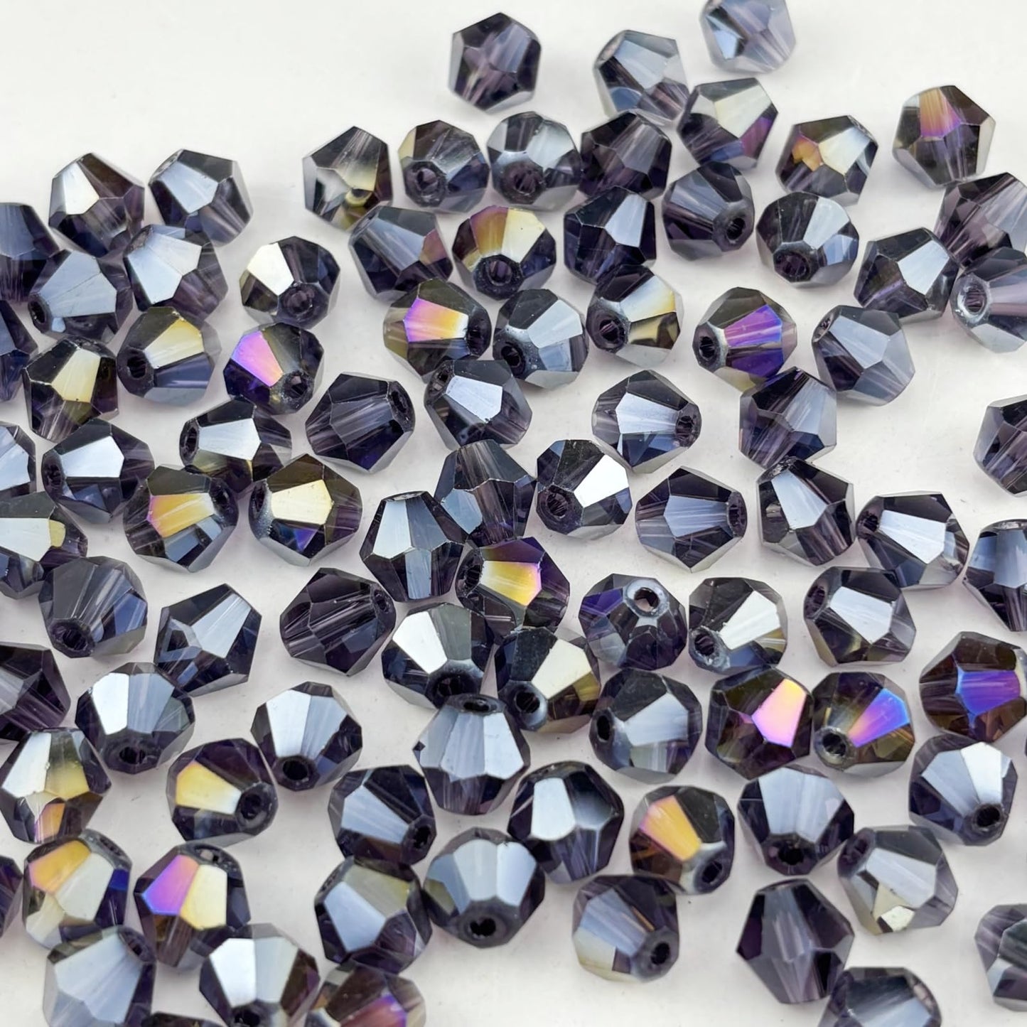 Pinhoollgo 500pcs 4mm Bicone Crystal Glass Beads Faceted Bicone Crystal Beads Bulk Glass Spacer Beads for Bracelets Necklace Pendants Earrings DIY Jewelry Craft Making(Violet AB)