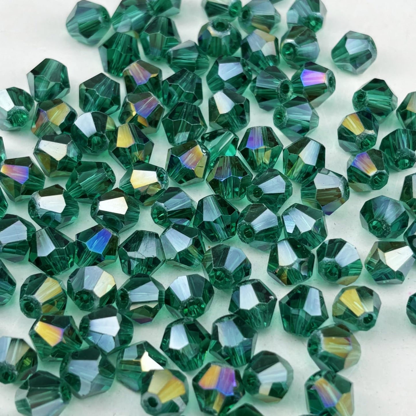Pinhoollgo 500pcs 4mm Bicone Crystal Glass Beads Faceted Bicone Crystal Beads Bulk Glass Spacer Beads for Bracelets Necklace Pendants Earrings DIY Jewelry Craft Making(Peacock Green AB)