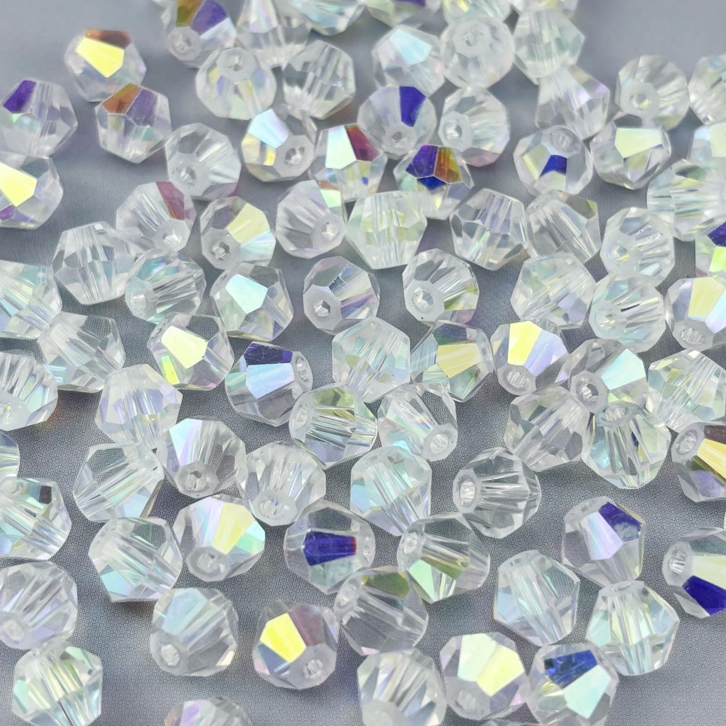 Pinhoollgo 500pcs 4mm Bicone Crystal Glass Beads Faceted Bicone Crystal Beads Bulk Glass Spacer Beads for Bracelets Necklace Pendants Earrings DIY Jewelry Craft Making(Crystal AB)
